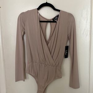 Cute beige bodysuit